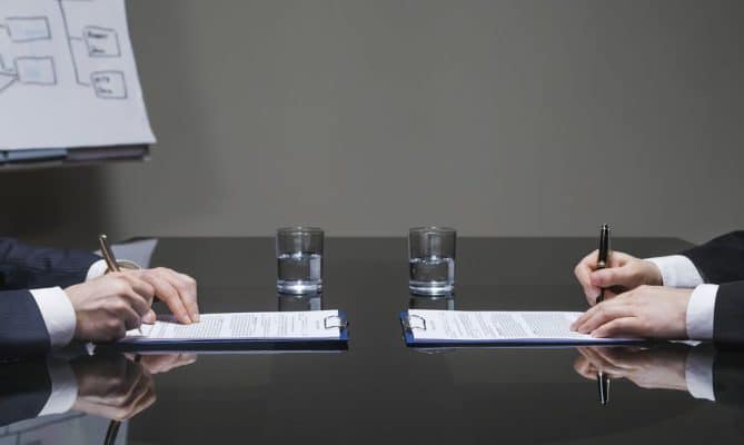 The Role of an Entertainment Lawyer in Negotiating Contracts